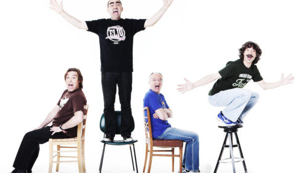 Elio e i tre componenti della band
