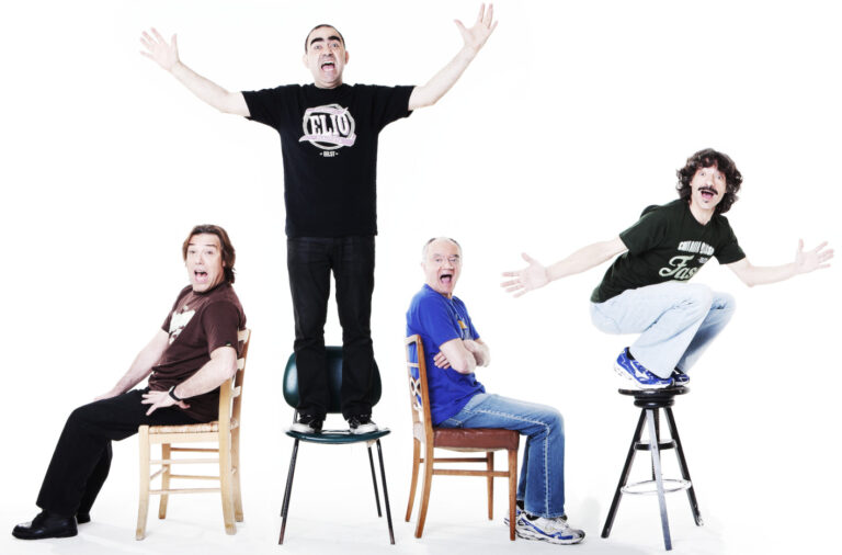 Elio e i tre componenti della band